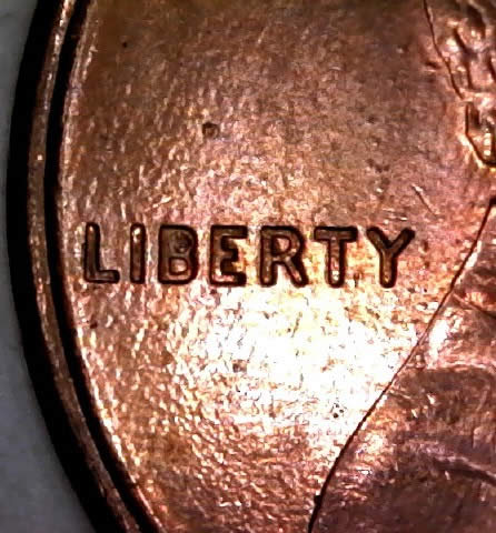 1994-P-Lincoln-Memorial-Cent-With-Broken-Die-Post-In-Top-